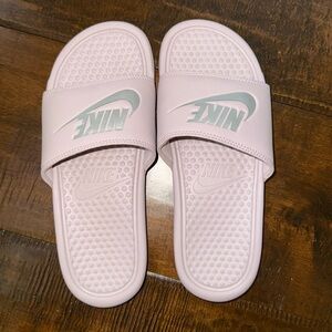 Light pink Nike slides